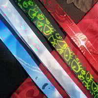 Image 1 of THE MAGNUS ARCHIVES lanyard, washi | The Eye, The Lonely, The Flesh, The Vast
