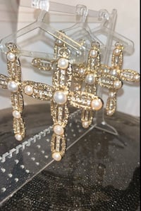 Purely pearly cross earrings
