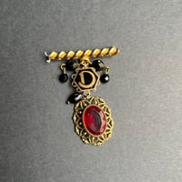 Broche « DOMINO »