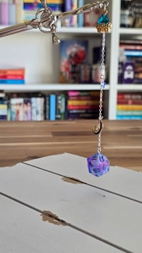 Image 1 of Bound Galaxy sword hair stick 