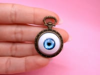 Image 1 of Pop Surreal Alice in Wonderland Compass Pendant