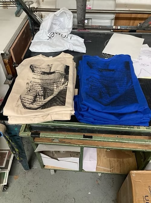 Image of BETWEEN THE STACKS TEE (COBALT)