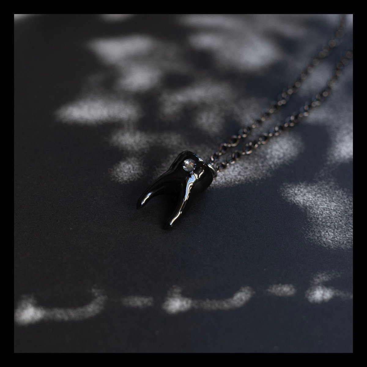 Swarovski tooth gem 2-root molar necklace in glossy black