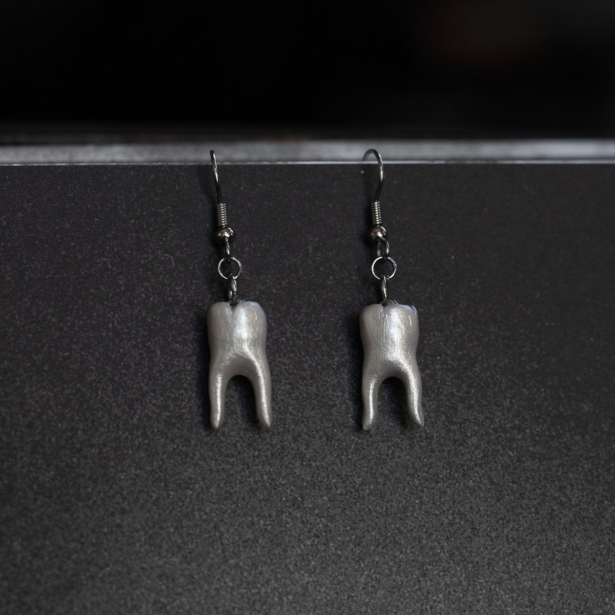 2-root molar earrings in pearl