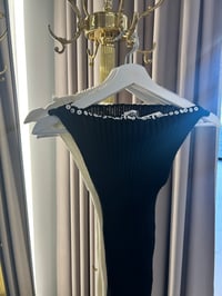 Image 4 of Merino wool black  boat neck top with Pearl buttons in front 