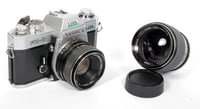 Image 1 of Yashica FX-2 35mm SLR Film Camera with 50mm F1.9 + 135mm F2.8 lens #1308 TESTED