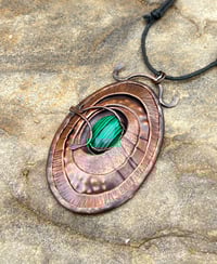 Image 1 of Transformation. Limpet inspired pendant with malachite stone