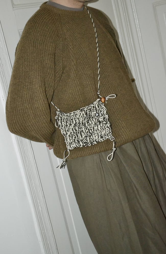 cable pouch with a wooden bead