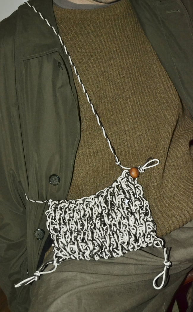 cable pouch with a wooden bead