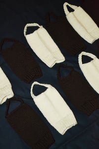 Image 3 of ankle warmers with a strap