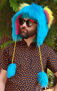 Image of Blue pink and yellow fluffy hat