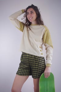 Image 1 of SOLINE --- Pull asymétrique à volant