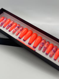 Image 1 of Bright Orange / Purple