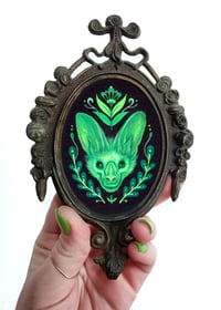 Image 3 of Glowie in oval frame