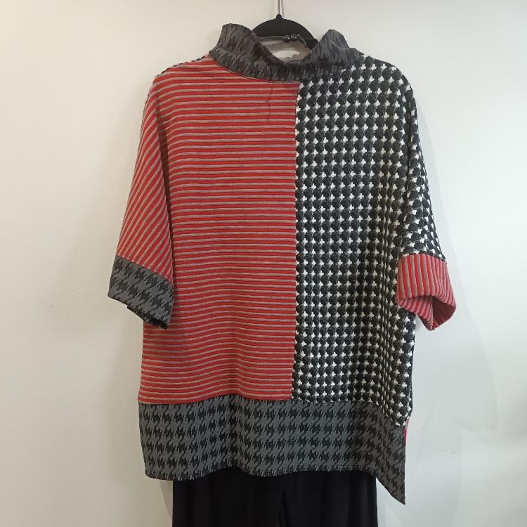 Image of black, red and white color block sweater