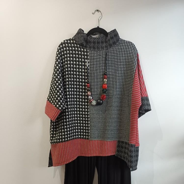 Image of black, red and white color block sweater