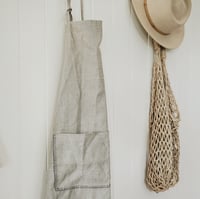 Image 1 of natural flax apron with pocket stitched detail