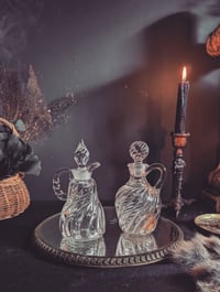 Image 1 of Swirl potion bottles 