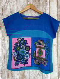 Image 1 of Splice-T Top. Blue sz12
