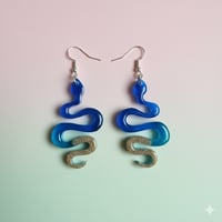 Serpientes Arena y Olas