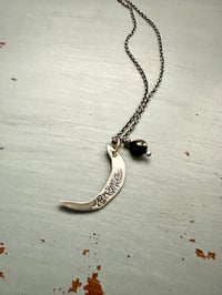 Image 3 of sterling silver moon pendant with brave inscription and green tourmaline