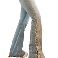 Image 1 of Women's Calvin Klein Vintage flare bottom jeans criss cross suede ties on sides knee to hem
