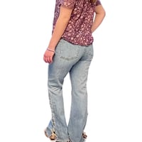 Image 4 of Women's Calvin Klein Vintage flare bottom jeans criss cross suede ties on sides knee to hem