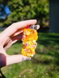 Image 2 of Orange Twinkle Lighter