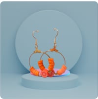Image 2 of Radiant Orange Polymer Clay Bead Earrings with Central Charm Accent