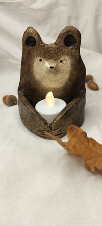 Karhu kynttilänpidike