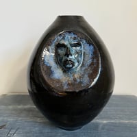 Image 1 of vases with faces i