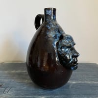 Image 3 of vases with faces iii