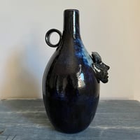 Image 4 of vases with faces iv