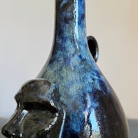 Image 5 of vases with faces iv