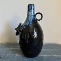 Image 3 of vases with faces iv