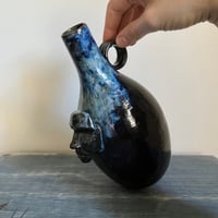 Image 2 of vases with faces iv