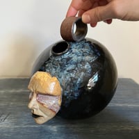 Image 1 of vases with faces v