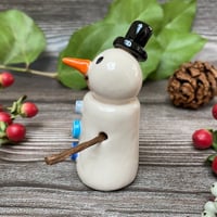 Image 4 of Handmade Ceramic Snowpeep with Black Hat/Blue Buttons
