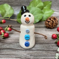 Image 5 of Handmade Ceramic Snowpeep with Black Hat/Blue Buttons