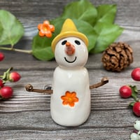 Image 4 of Handmade Ceramic Snowpeep with Yellow Hat/Orange Flowers