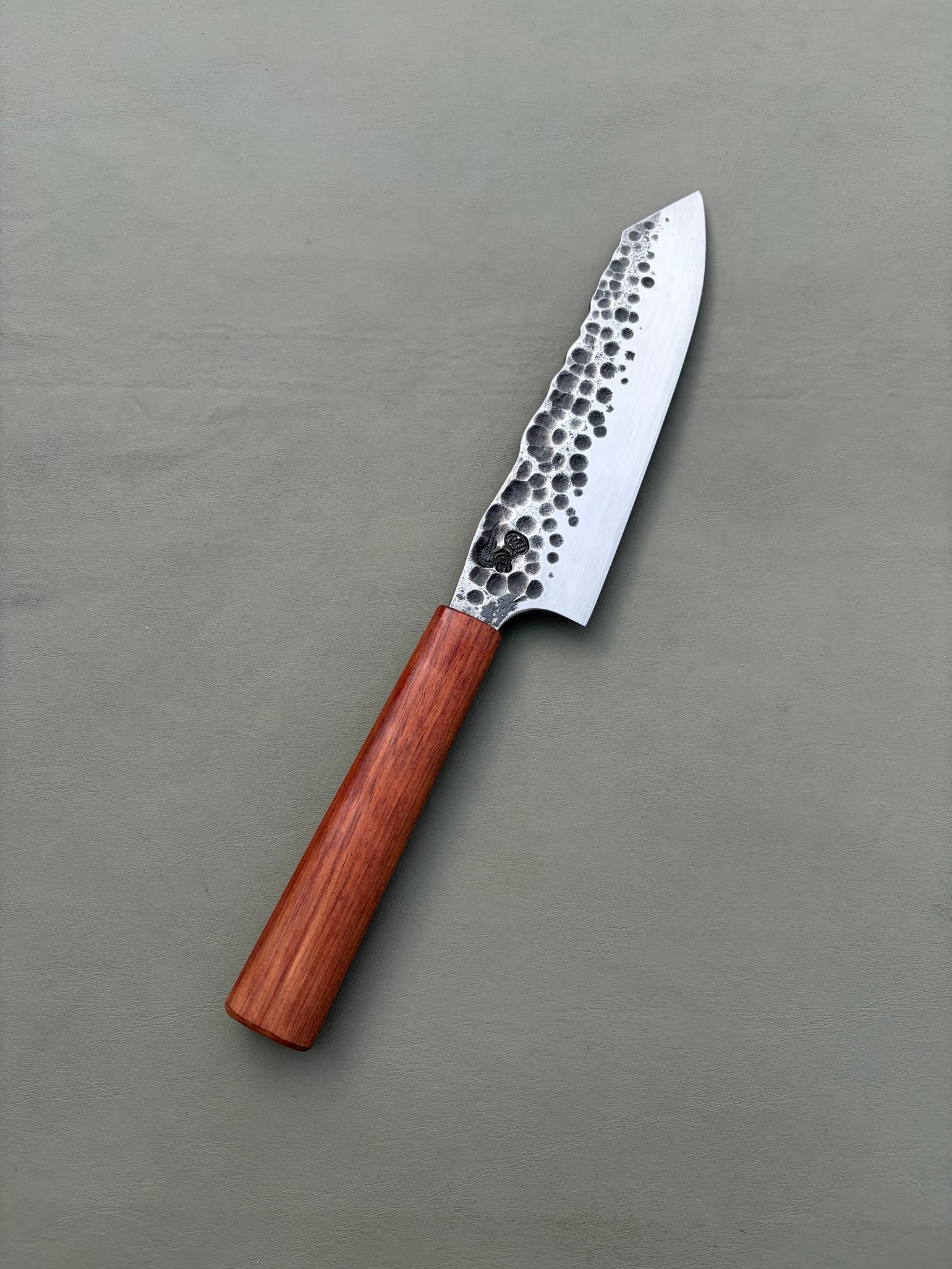 Image of 8” all purpose with hammer marks