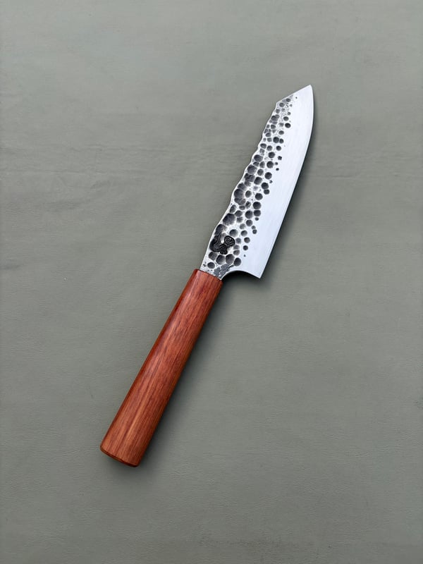 Image of 8” all purpose with hammer marks