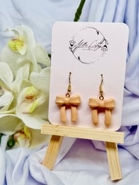 Image 1 of Signature Bow +