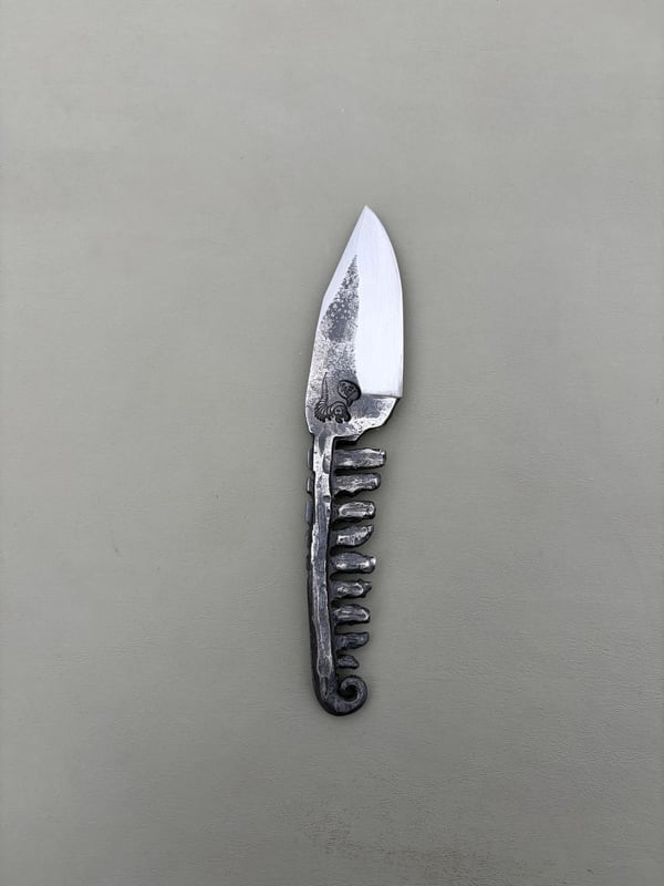 Image of EDC with fern inspired handle