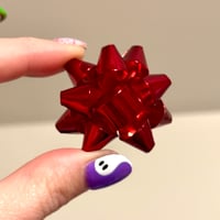 Red XL Bow Plugs (sizes 5/8-1")