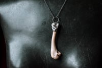 Image 1 of Silver Capped Raccoon Leg Bone necklace