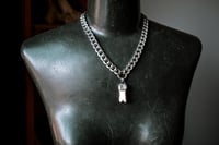 Image 1 of Knuckles silver capped bone necklace