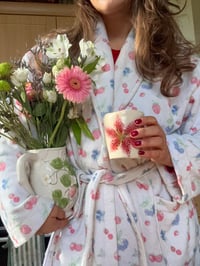 Image 2 of stargazer lily travel mug