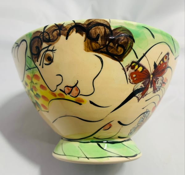 Image of Small green and yellow bowl