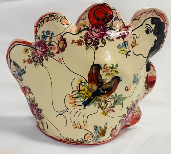 Image of Pink and red cut out figure vase